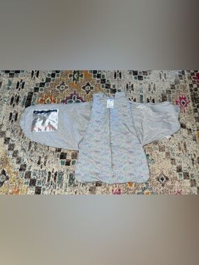 Baby Halo Swaddle sleep Sack in Light Gray with Subtle Blue and Green Print